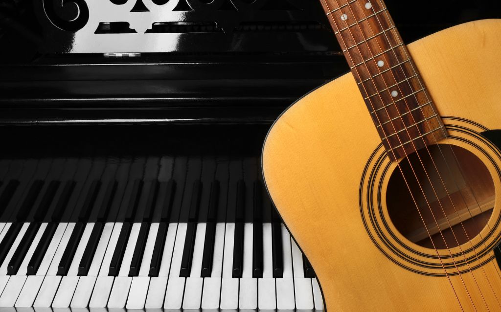 Is fingerstyle guitar easier than piano?